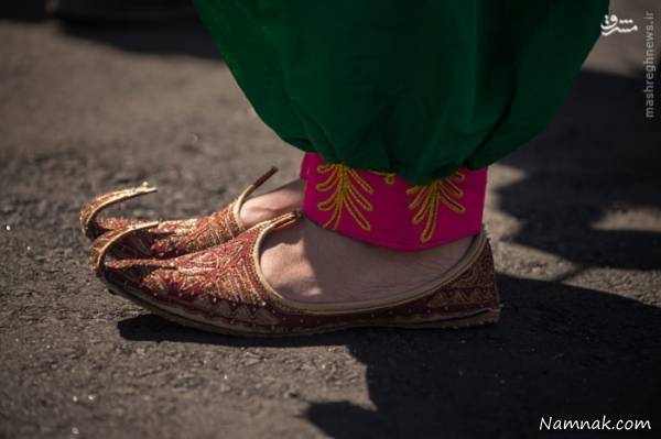 لباس دختر افغانی سوژه عکاسان  لباس کاروان افغانی در مسابقات المپیک